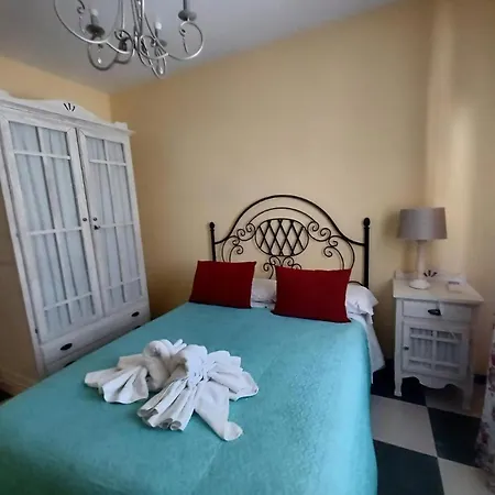 Апартаменты Tipica Casa En Con Patio Y Terraza Фрихилиана